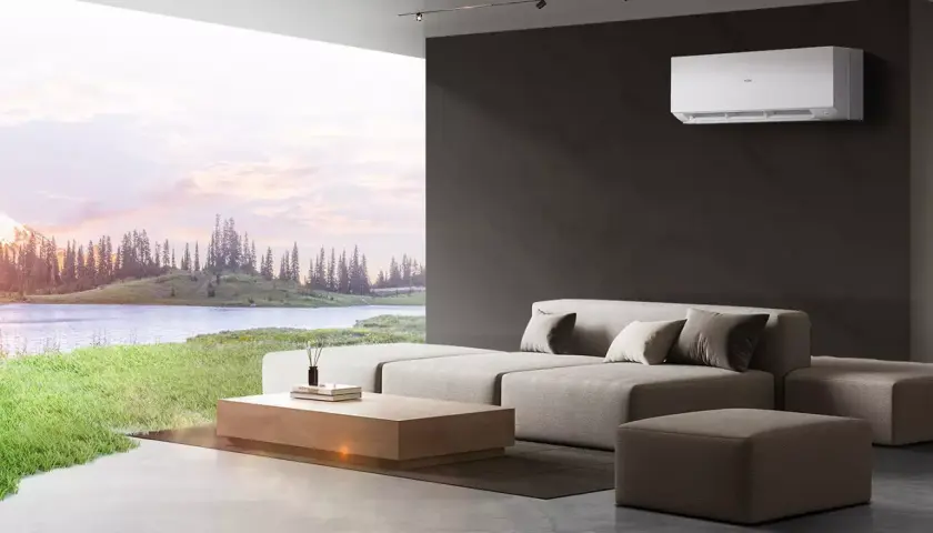Nowoczesny salon z klimatyzatorem i widokiem na jezioro i las.